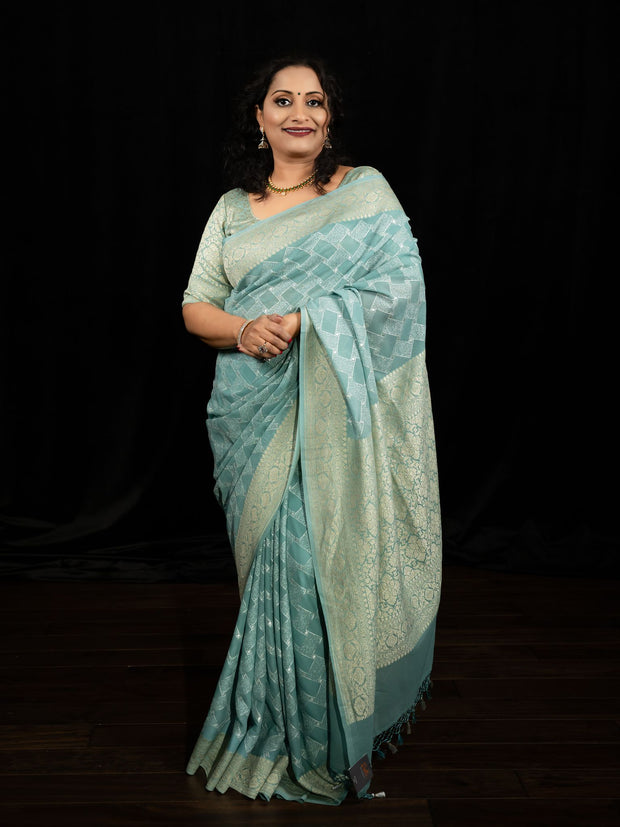 Light blue pure banarsi georgette saree with chikan work, stitched blouse