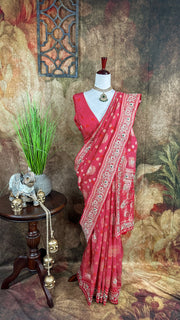 Red dola silk saree with zardosi hand work , with stitched blouse