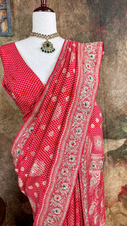 Red dola silk saree with zardosi hand work , with stitched blouse