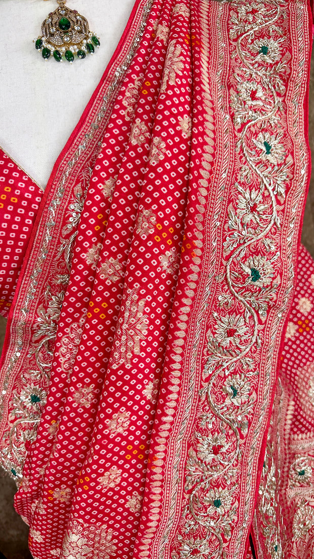 Red dola silk saree with zardosi hand work , with stitched blouse